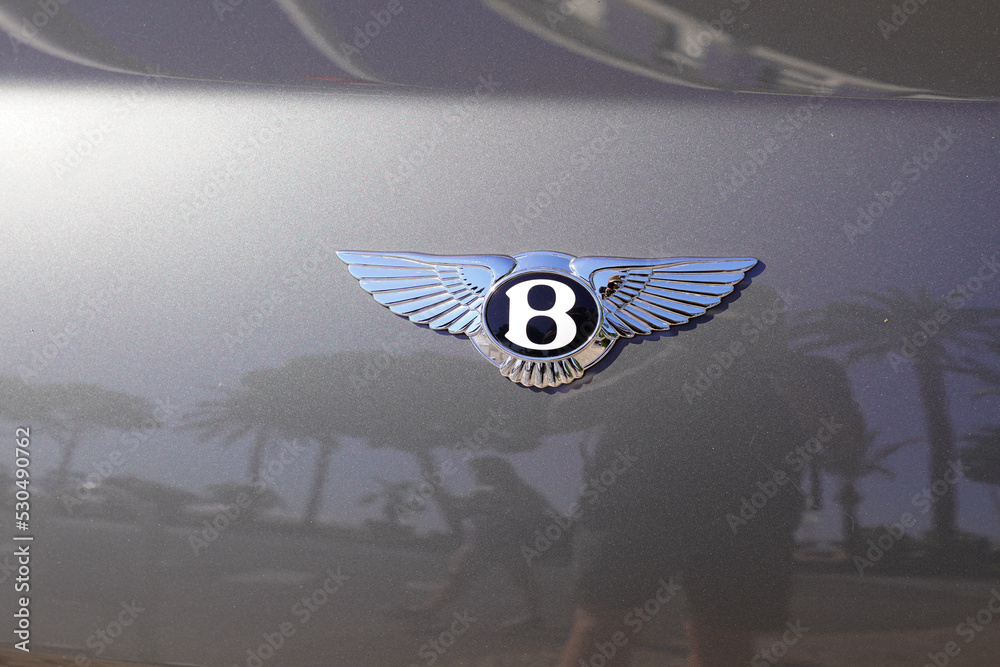 Bentley logo text and front sign chrome emblem of british luxury brand  sport car Photos