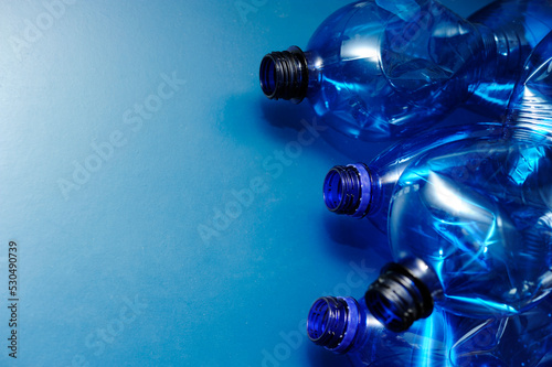 empty blue plastic bottle, recycling concept