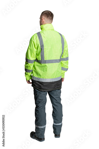 a man in green special clothes for workers in a helmet on a white isolated background