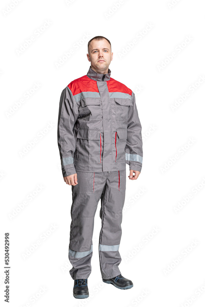 man in special clothes for workers on a white isolated background. a man in uniform man in special clothes for workers on a white isolated background. a man in uniform