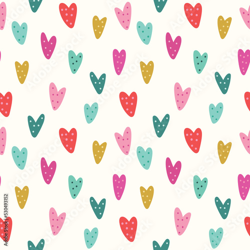 Heart pattern background. Cute vector seamless repeat pattern design of textured hand drawn spotted love hearts. 