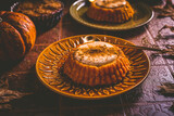 Pumpkin mini pie, tartlet made for Thanksgiving day on old wooden background