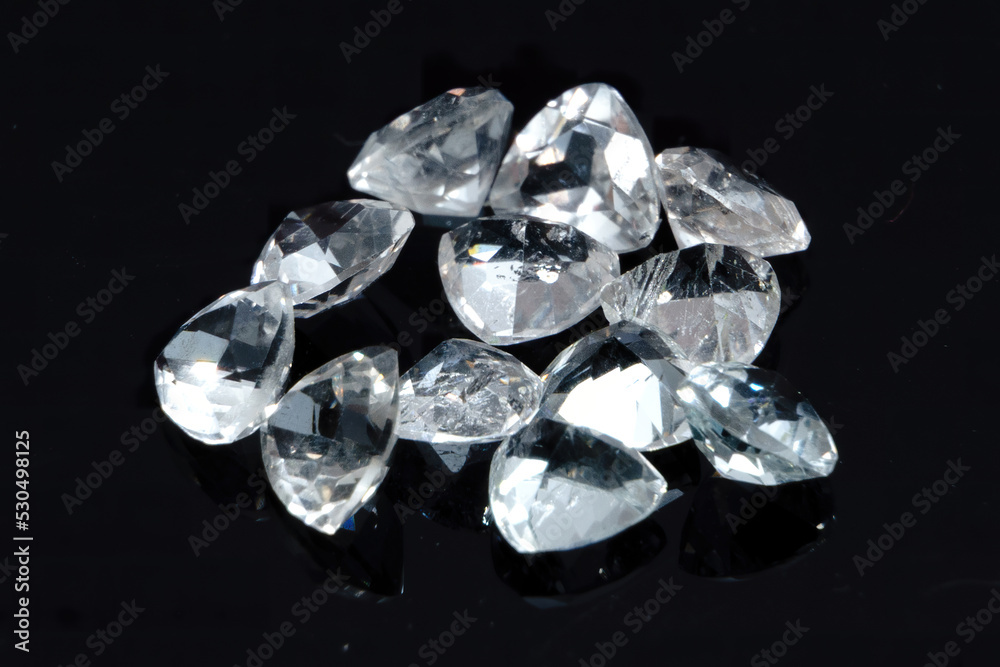 Natural gemstone white topaz on black background Natural gemstone white topaz on black background
