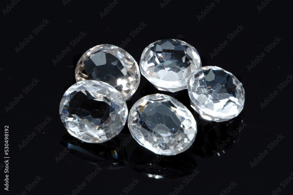 Natural gemstone white topaz on black background Natural gemstone white topaz on black background