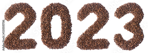 Fotografie The figures of 2023 from coffee beans on a white isolated background