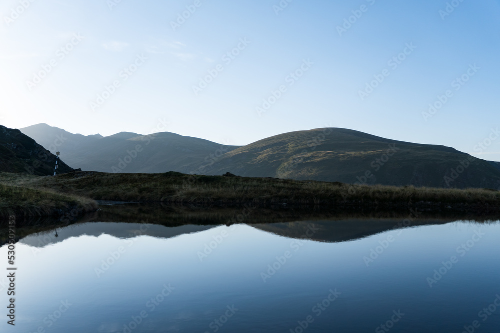 lake reflection, Zarna Saddle, Fagaras Mountains, Romania lake reflection, Zarna Saddle, Fagaras Mountains, Romania