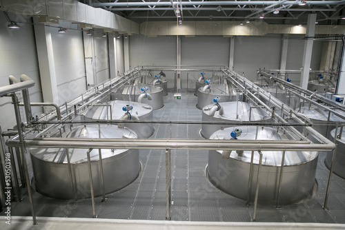 agro-storage-elevator at an agro-combine for processing, drying, cleaning and storage of grain, flour, and cereals. Granary, bunkering of bulk cargoes with grain.