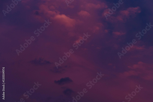 Cloudy pink-purple sunset. Evening view. summer background
