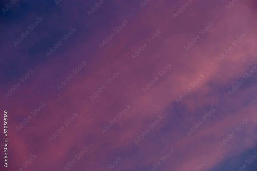 Cloudy pink-purple sunset. Evening view. summer background