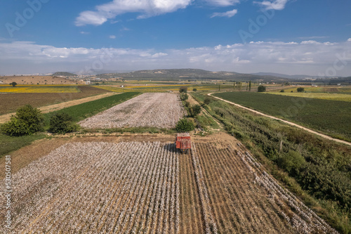 Drone footage . Cotton collecting vehicle . Cotton harvesting in Turkey - Izmir - Menemen plain