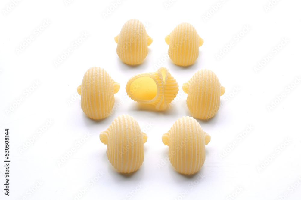 small composition of pasta on white background small composition of pasta on white background