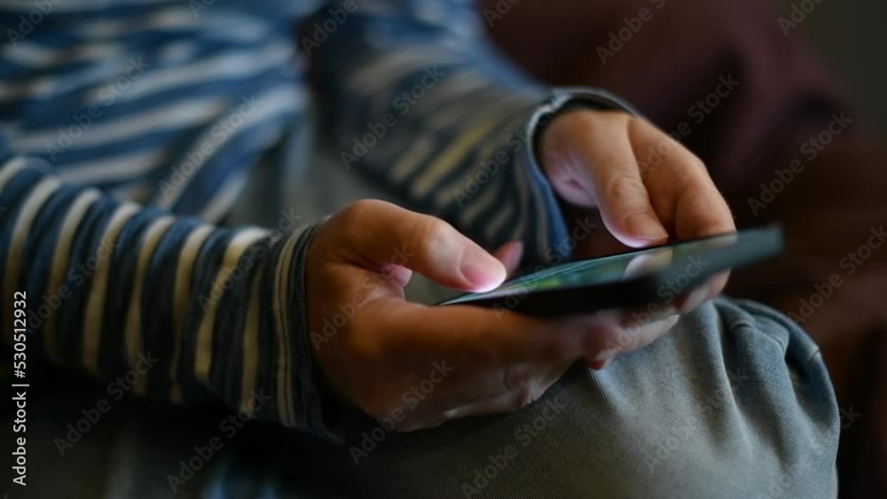 Closeup of female hands using smartphone for internet social media browsing and networking