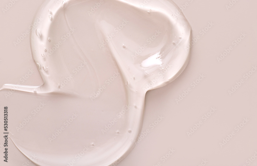 texture gel serum on beige background
texture gel serum on beige background