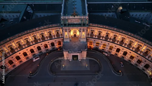 Vienna at night, the capital of Austria, aerial view of Vienna in the evening light, flying over famous Homburg palace in downtown Vienna  photo