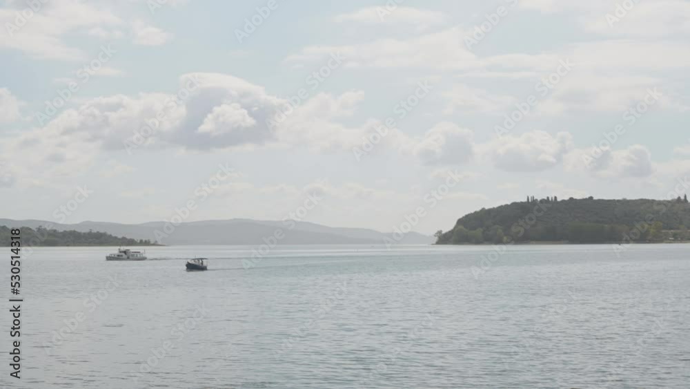 Isola Maggiore and Isola Minore of Lake Trasimeno, viewed from Tuoro, Perugia Italy Isola Maggiore and Isola Minore of Lake Trasimeno, viewed from Tuoro, Perugia Italy