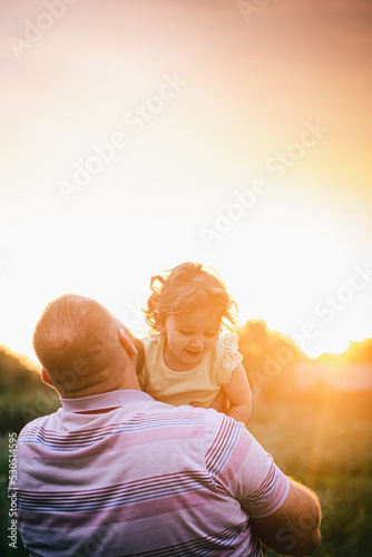 parent and child in the golden hour