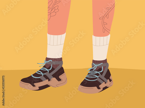 Sneakers, fashion sport shoes on men legs with tattoos. Modern trendy athletic footwear and socks on male feet. Sporty comfy footgear model in casual style. Colored flat vector illustration