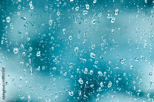 Texture of water drops on glass. Decorative abstract background
