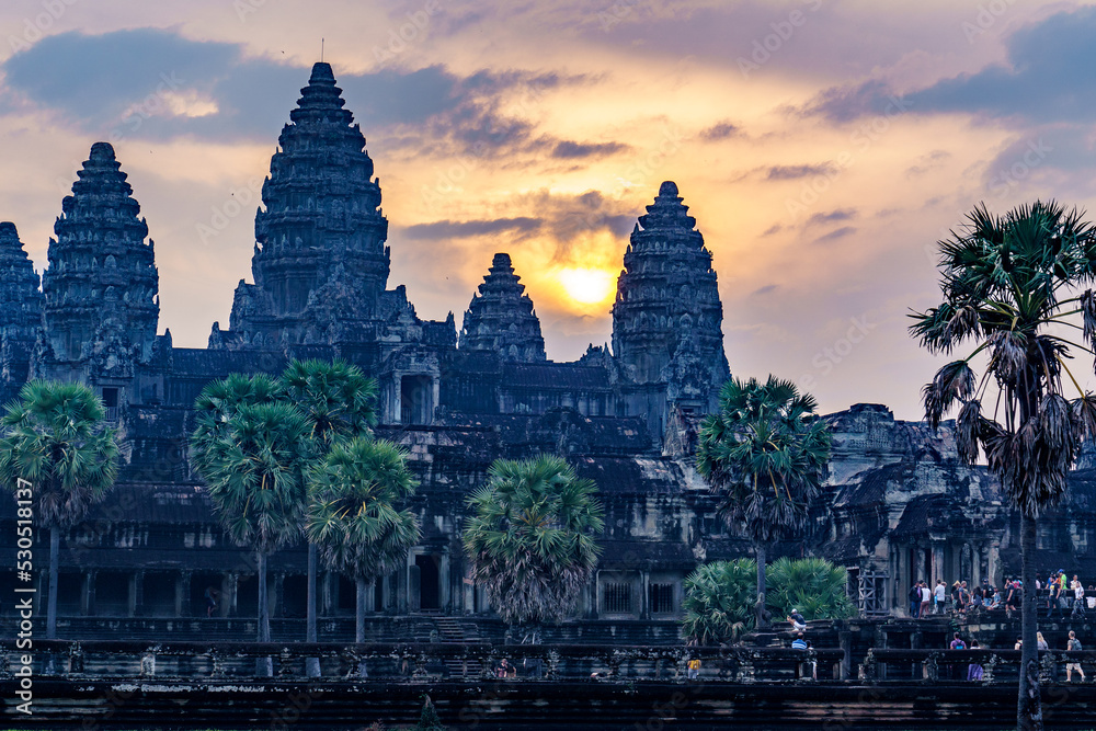 Obraz premium Cambodia. Siem Reap Province. Sunrise at Angkor Wat (Temple City) at early morning. A Buddhist and temple complex in Cambodia and the largest religious monument in the world