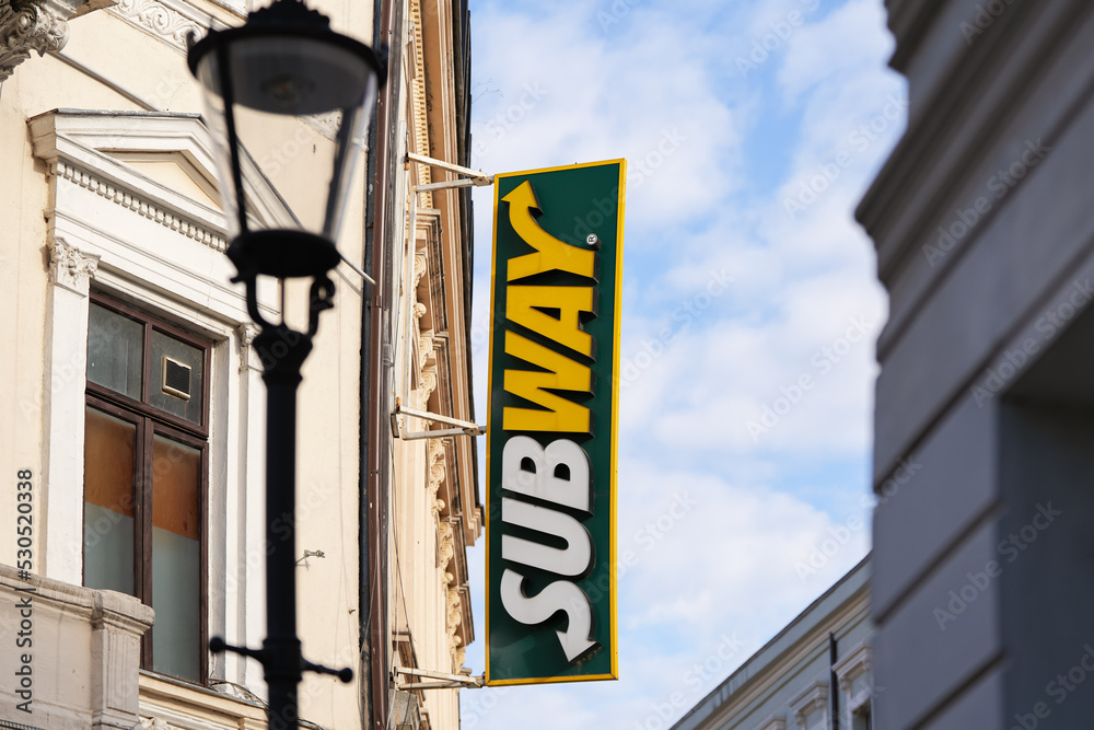 fast-food-industry-restaurant-the-logo-sign-of-a-subway-american-multi