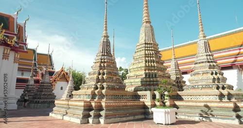Wat Po (Wat Pho), Temple of Reclining Buddha, Royal Monastery, Popular Tourist Attractions in Bangkok, Travel Thailand Concept. photo