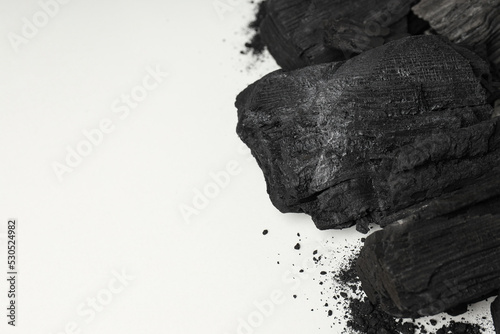 Natural wood or hardwood charcoal, space for text
