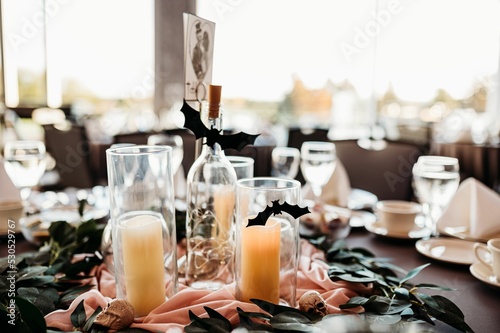 Valokuvatapetti Beautiful shot of a wedding banquet table with Halloween themed decoration