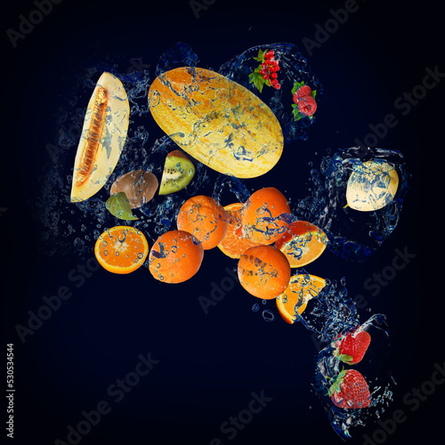 Wallpaper with fruits in water - juicy kiwi, melon, orange, pear, currant, strawberry are full of vitamins