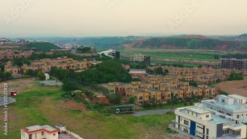 Drone view of modern houses and apartment complexes in Bahria Town, Islamabad, Pakistan photo