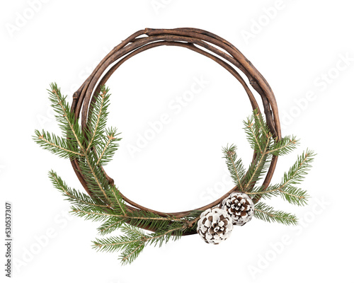 Christmas and New Year frame. Round frame of willow rods, spruce branches and two pine cones. Natural winter background.