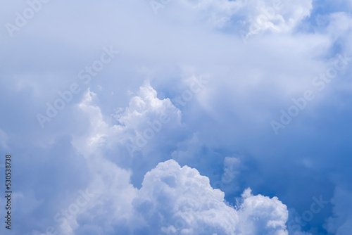 Beautiful background with many white cumulus clouds. Aerial view. Copy space.