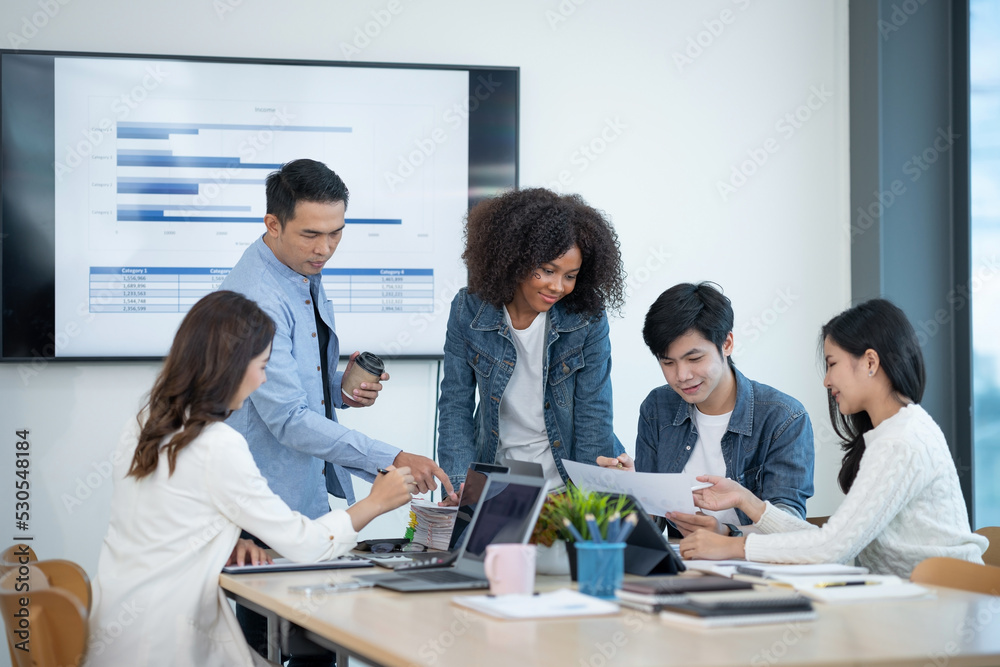 Group of creative young Asian business people are meeting to exchange idea from each department to push forward new project at the meeting. Group of creative young Asian business people are meeting to exchange idea from each department to push forward new project at the meeting.