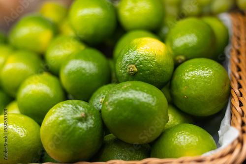 close up of limes in the market