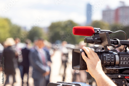 Shooting media or news event with television camera