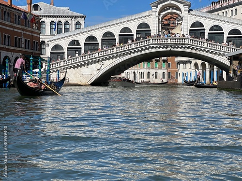 Rialto bridge and a gondola © eric