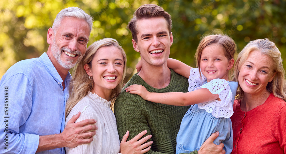 Portrait Of Multi-Generation Family Enjoying Walk In Countryside Together Portrait Of Multi-Generation Family Enjoying Walk In Countryside Together