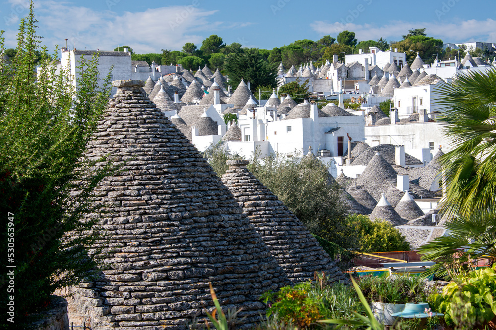 Apulia Symbol typical trulli houses in Alberobello, Puglia, Italy. Traditional ...