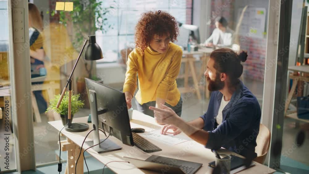 Confident Businesswoman Talking to a Colleague in a Creative Marketing Agency. Two Excited Managers Solving a Corporate Problem, High Five Each Other After Finding a Successful Solution.