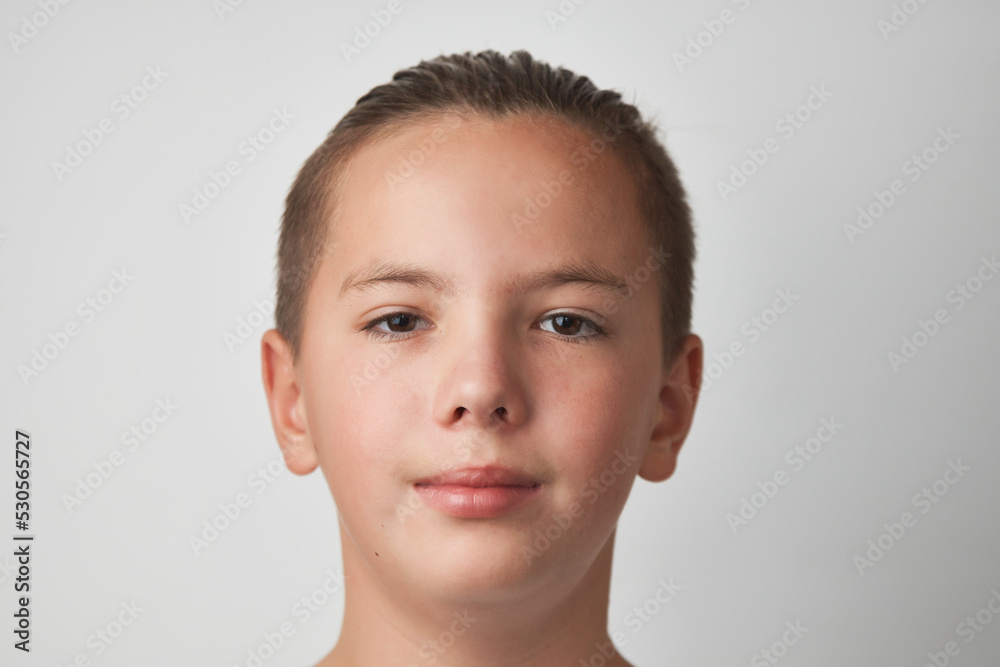 Portrait of a teenage boy on white background Portrait of a teenage boy on white background