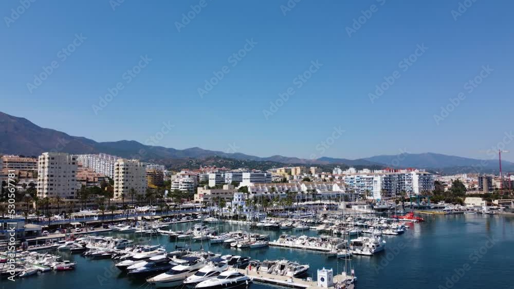 Iconic cityscape of Estepona city with harbour in bird's eye view Iconic cityscape of Estepona city with harbour in bird's eye view
