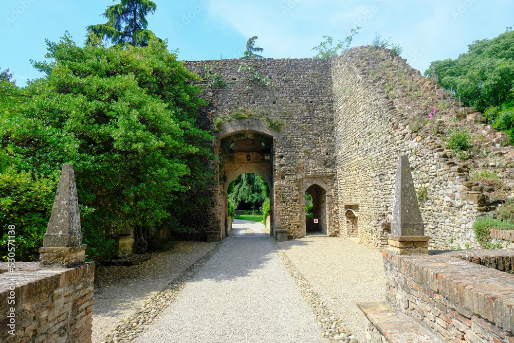 entrance of the Castle/Castello of Montecchiarugolo, Parma, Italy. Building of the castle through the arches
