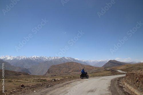 Motorcyclist on highest motorable road in Indian Himalayas