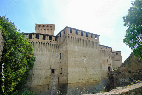 exterior of fortress of the Castle, Castello of Montecchiarugolo, Parma, Italy and a bridge over the ditch. Travel, tourism