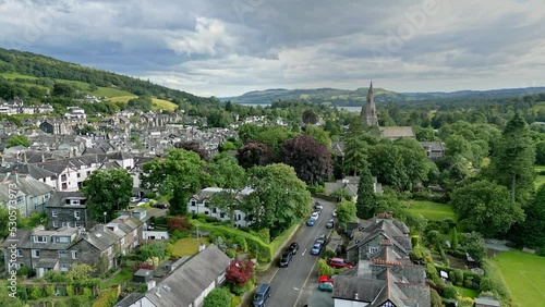 Aerial video footage showing the market town of Ambleside, perfectly located in the heart of the national park. Surrounded by majestic Lakeland fells. photo