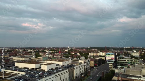 landmark beer brush Bierpinsel.
Dramatic aerial view flight pedestal down drone
of Berlin steglitz germany at summer day sunset August 2022. Marnitz 4k Cinematic from above photo