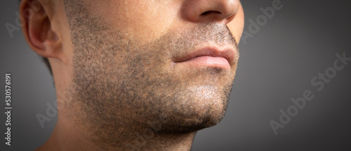 Closeup of caucasian male mouth.