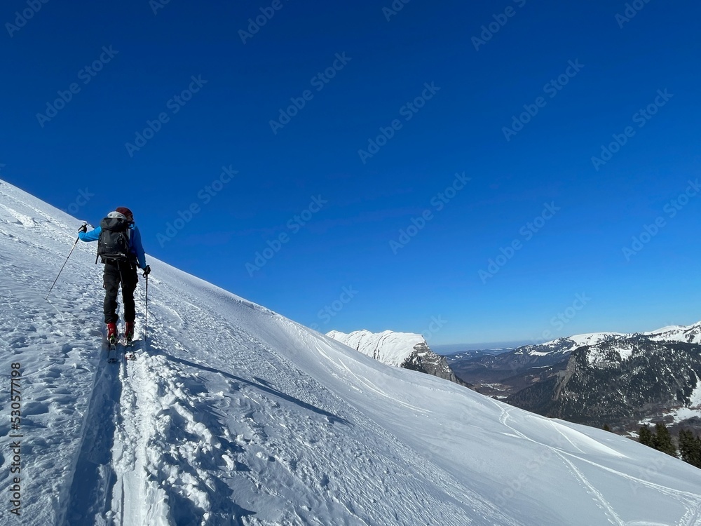 Man ski touring in the Austrian Alps. Bregenzerwald, Vorarlberg, Austria.