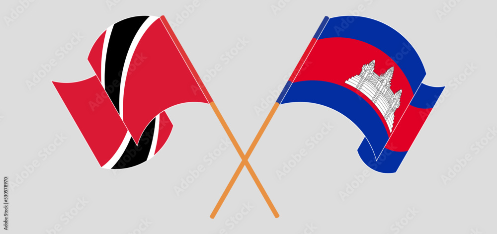 Crossed and waving flags of Trinidad and Tobago and Cambodia