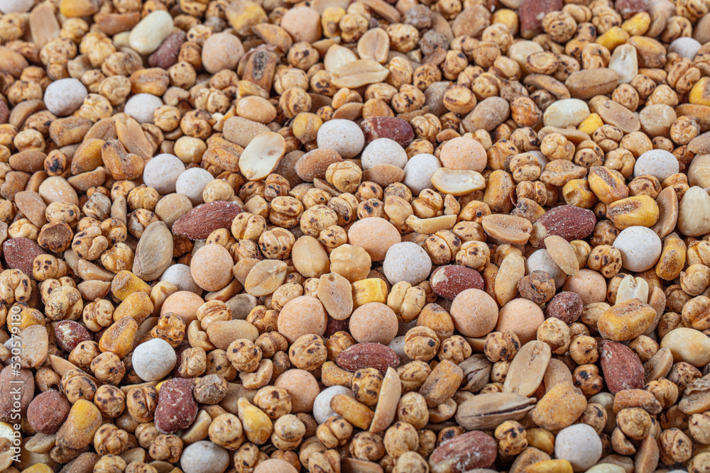 Mixed nuts, Background of various nuts (chickpeas, peanuts, pistachios, corn). Vegetarian meal. healthy eating concept.