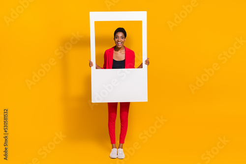 Photo of crazy short butch hair lady guy hold paper shot frame wear red trendy jacket isolated bright color background